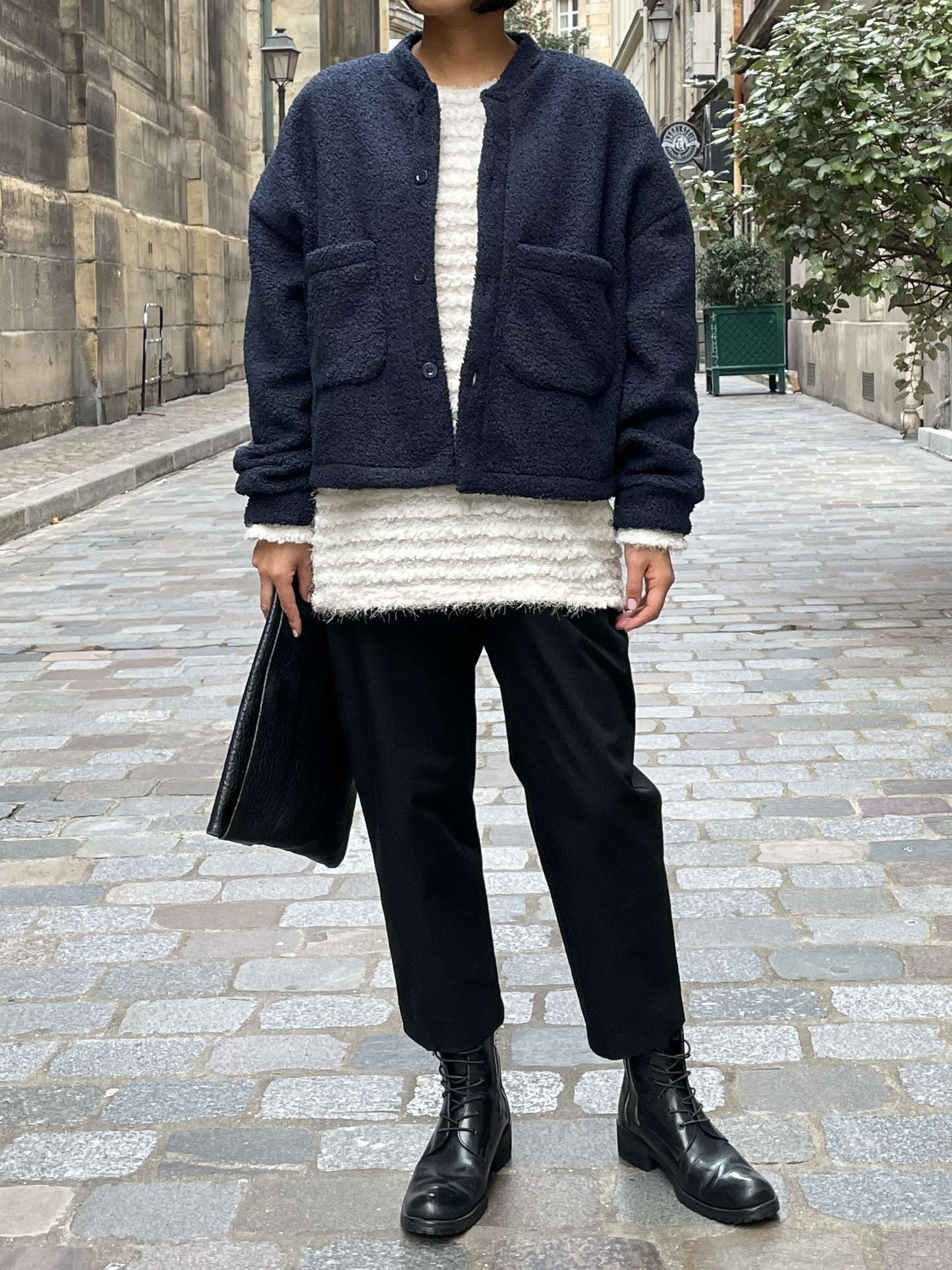 Blouson en laine bouclée Pièce basique intemporelle
