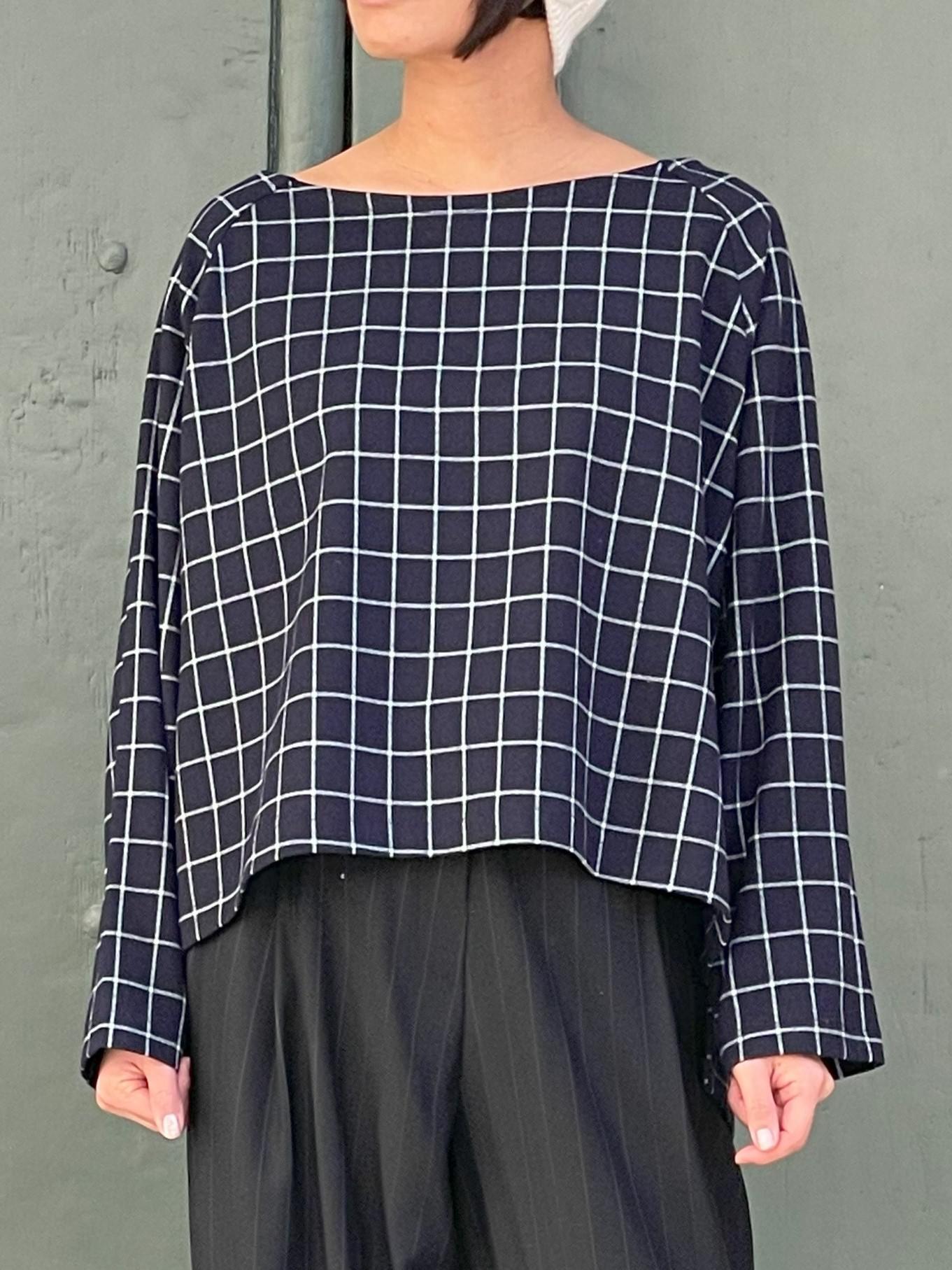 Blouse en laine marine extensible,motif à carreaux