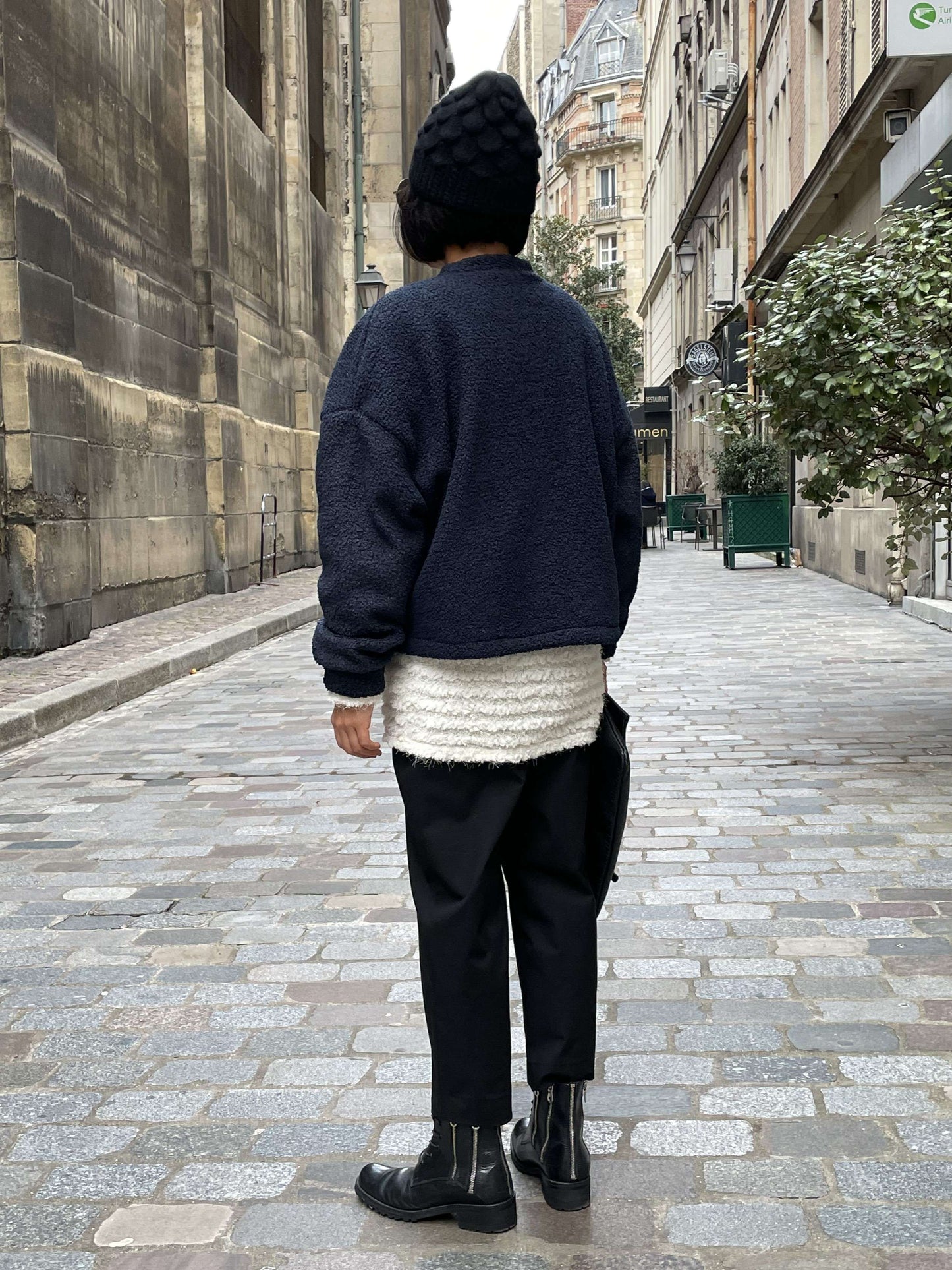 Blouson en laine bouclée Pièce basique intemporelle