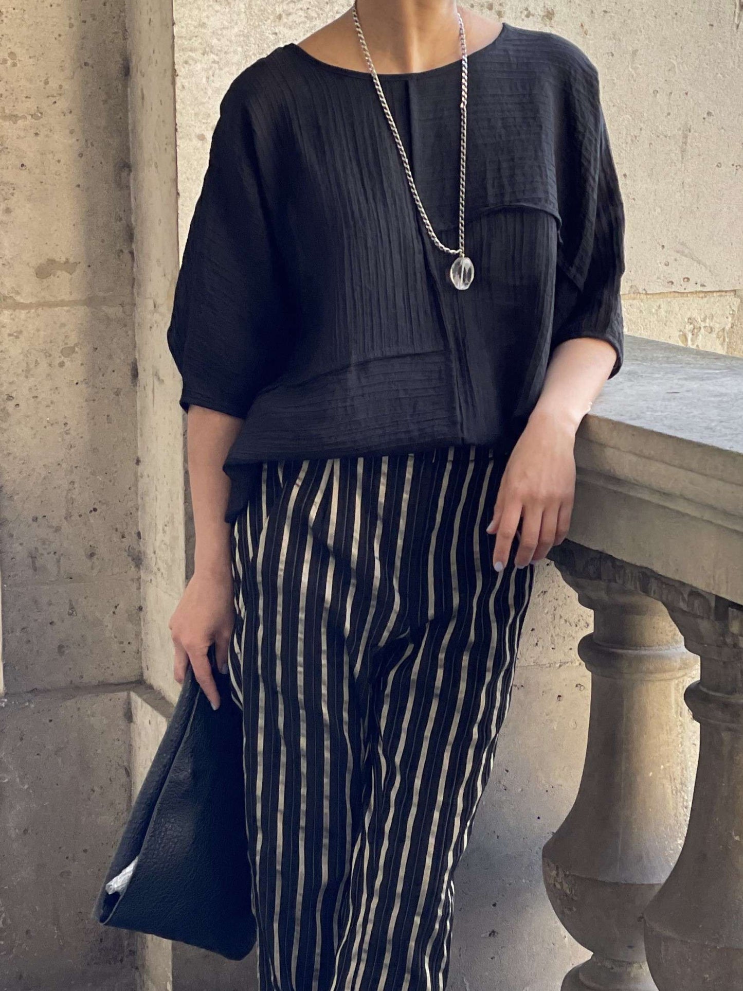 Haut ample plissée noire