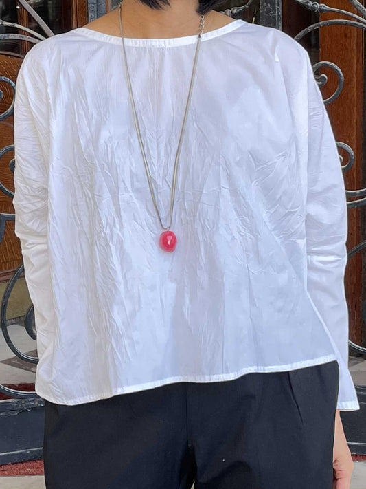 Blouse blanche brillante